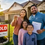 Low-income Texas family standing proudly outside their first newly purchased home using home buyer grants assistance in 2026