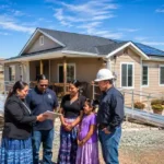 Native American homeowners receiving home repair grant assistance for roof replacement and home rehabilitation